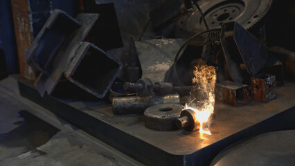 Laser removes rust on metal. Media. Hand gun with laser removes rust on metal. Laser with beam removes metal rust on parts