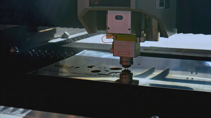 Robotic machine carves patterns on metal. Media. Artificial intelligence in industrial machine with...