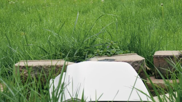 Anonymous young adult throwing office printer copier shattered broken conceptual rage mood