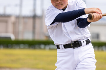 素振りをする野球少年　baseball boy