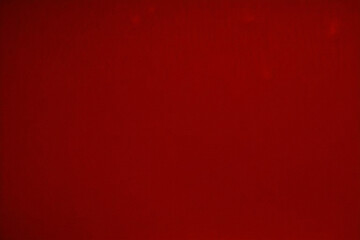 Red grunge texture with flash of light bright red texture background, abstract textured aged backdrop. Red abstraction. Red granite. Red granite background. Old vintage retro red background texture.