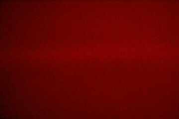 Fototapeta premium Red grunge texture with flash of light bright red texture background, abstract textured aged backdrop. Red abstraction. Red granite. Red granite background. Old vintage retro red background texture.