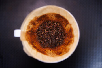 Close-up of Freshly Brewed V60 Pour over Coffee Grounds in Filter from Above