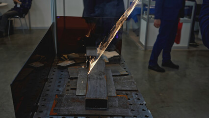 Laser beam that removes rust on metal. Media. Laser beam line removes rusty trace on metal. Industrial laser treatment of metal from rust