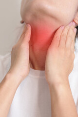 Woman checking Thyroid gland disease. Hand holding Neck pain. Hyperthyroidism, Hypothyroidism,...