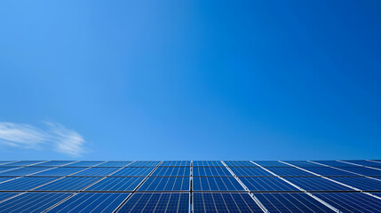 A blue sky with a few clouds and a solar panel