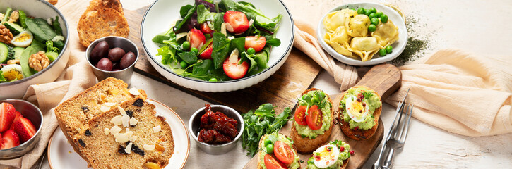Summer table with various food.