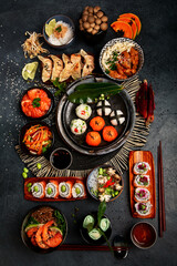 Traditional Japanese food dishes served on the table.