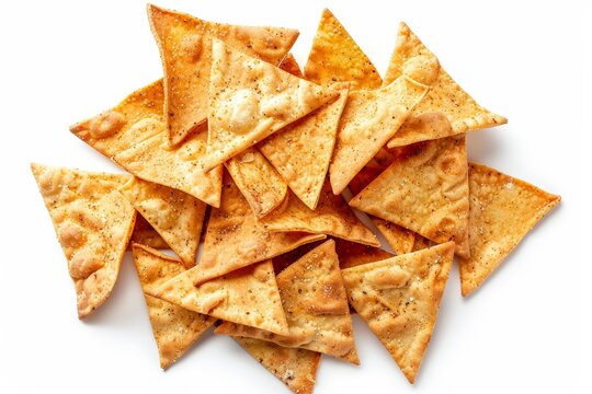 Small pile of isolated pita chips with herbs and spices spicy Mediterranean snack on white background