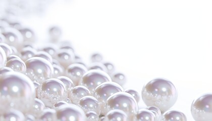 White shiny pearls of various sizes on a pearl background room for your text