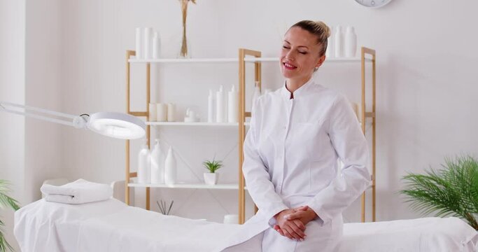 Portrait of a happy woman doctor dermatologist or cosmetologist is portrayed in office at the clinic or beauty salon. Beautician professional demeanor and dedication to providing quality care.