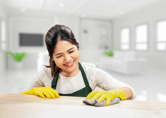 Asian housekeeper wear gloves apron