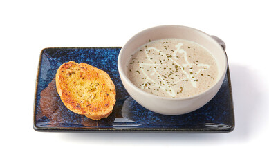 Creamy Mushroom Soup with Garlic Butter Bread (crouton) isolated on white background.