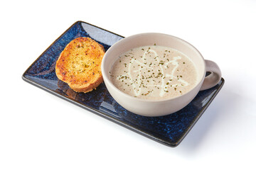 Creamy Mushroom Soup with Garlic Butter Bread (crouton) isolated on white background.