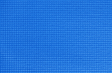 Blue yoga mat texture, pattern of rubber for background.