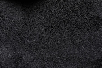 Black texture of soft plush fabric, terry cloth