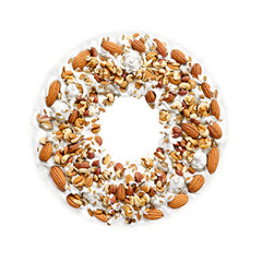 Obraz premium Yogurt coated nut mix mandala floating yogurt covered nuts and seeds Food and culinary concept