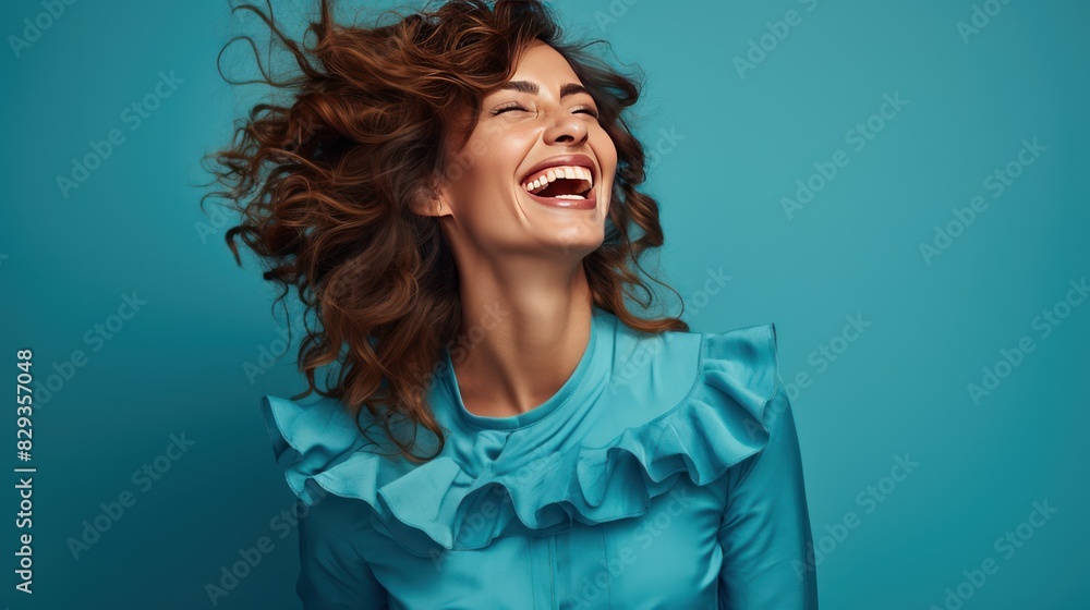 Wall mural woman with happiness, stylish outfit against a captivating blue background