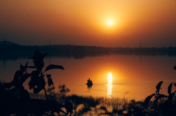 majestic evening view at Baranti lake (a popular travel spot in Purulia), with holden hued last...