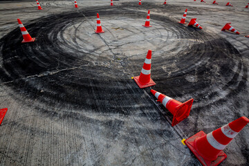 Race track road with tire mark skid road Backgroundn and traffic cone on road track, Motor sport...
