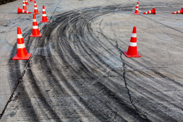 Race track road with tire mark skid road Backgroundn and traffic cone on road track, Motor sport...