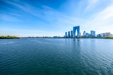 Obraz premium Suzhou modern city building skyline and lake scenery