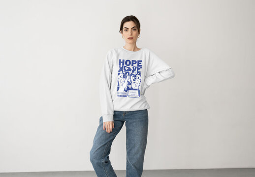 Mockup of woman in customizable sweatshirt, hand on hip
