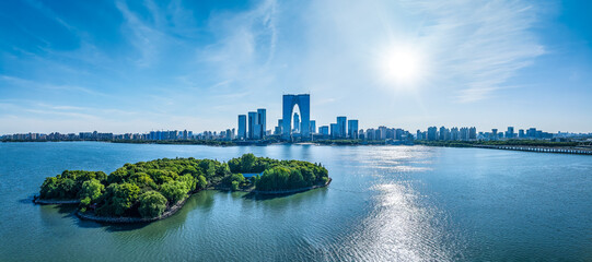 Suzhou modern city building skyline and lake scenery