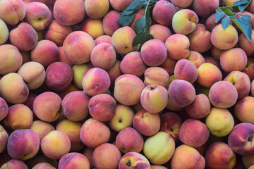 Peaches Fruits Background In The Grocery Market. Healthy And Tasty Vegetarian Food. Top View