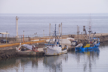 Fototapeta premium The small town of Santa Rosalia in the state of Baja California Sur, with its ships in the port, an old mining town in Mexico