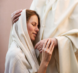 Jesus hugging a praying woman