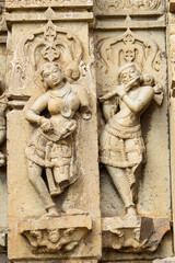 Sculpture of Lord Krishna and Dancing Women on the Kedareshwara Temple, Dharmapuri, Beed Maharashtra India.