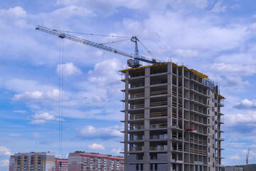 Construction tower crane on a construction site.