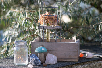 Composition of decorations, garlands and toys on a summer balcony