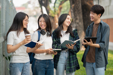 Group of students with books preparing for exams during holidays.