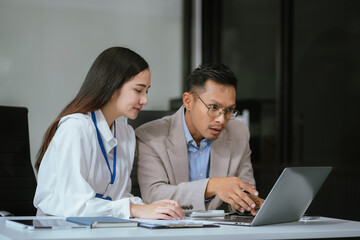 Obraz premium Project manager working and update tasks with milestones progress planning and professional investor working new start up project in the office..