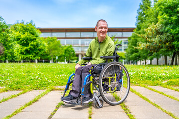 Disabled man with cerebral palsy in the university campus