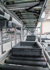 Obraz premium packing line in a logistics warehouse. 