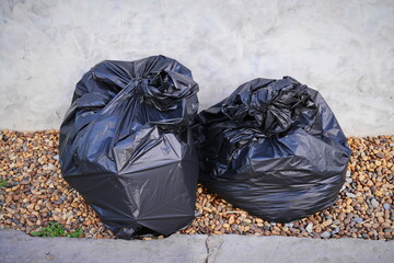 Three Black Garbage outdoor in garden