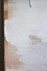 Texture of paints on the wooden canvas.