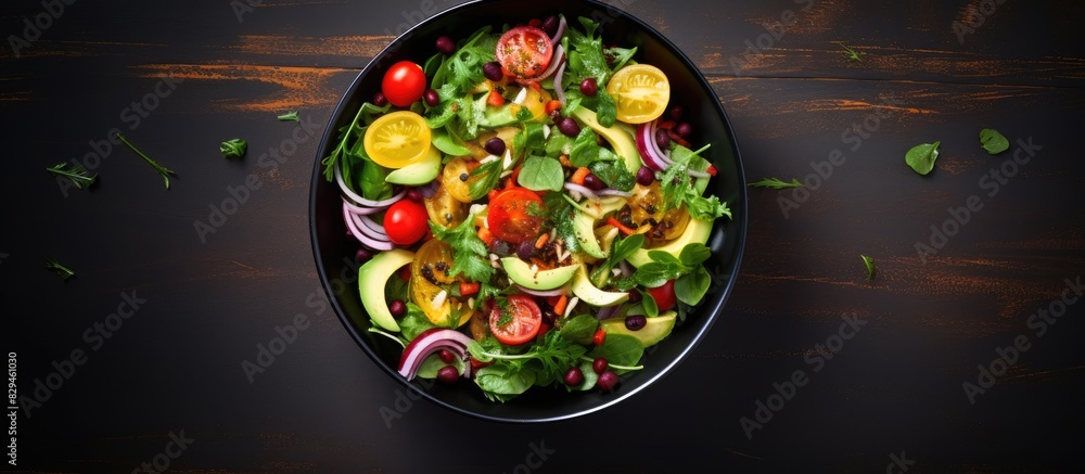 Aufkleber ready served salad in bowl on dark table background view from above detox healthy food concept. copy