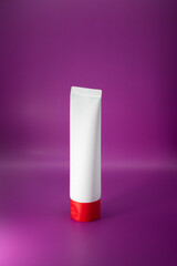 Clear cosmetic container mock up on pink background. Face and body skin care cream pack.