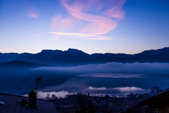 Pergine Valsugana commune with Caldonazzo Lake at dusk in Trento, Italy