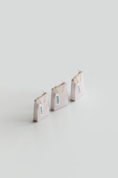 Shopping bags over gray background