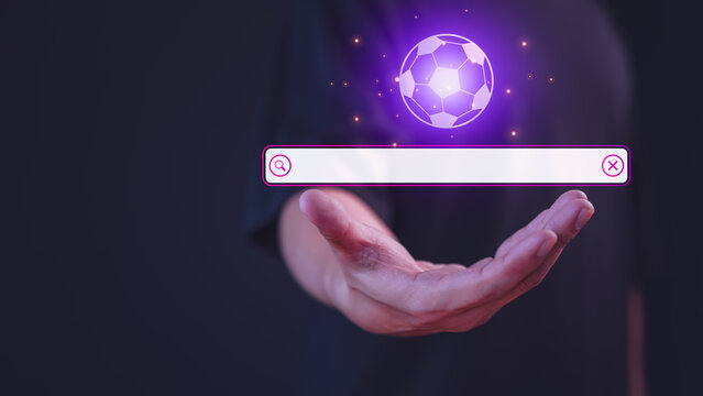 Male hand showing the internet search bar. SEO technology networking engine optimization internet with search bar. Searching browsing internet data information for Football live program concept.