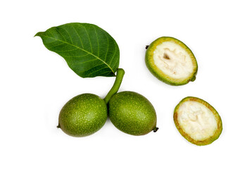 Green walnuts isolated on a white background, top view