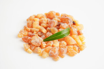 Frankincense or olibanum aromatic resin isolated on white background used in incense and perfumes.