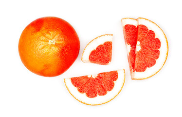 Grapefruit and slices isolated on a white background, flat lay, top view