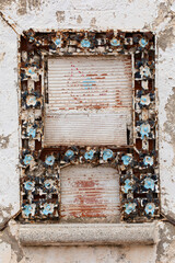 Naklejka premium Decayed Ticket Window of Abandoned Movie Theatre in Oropesa del Mar, Spain