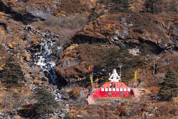 INDIA, SIKKIM, GANGTOK, December 2023, Devotee, at View of Lord Statue of Shiva Near Baba Harbhajan...